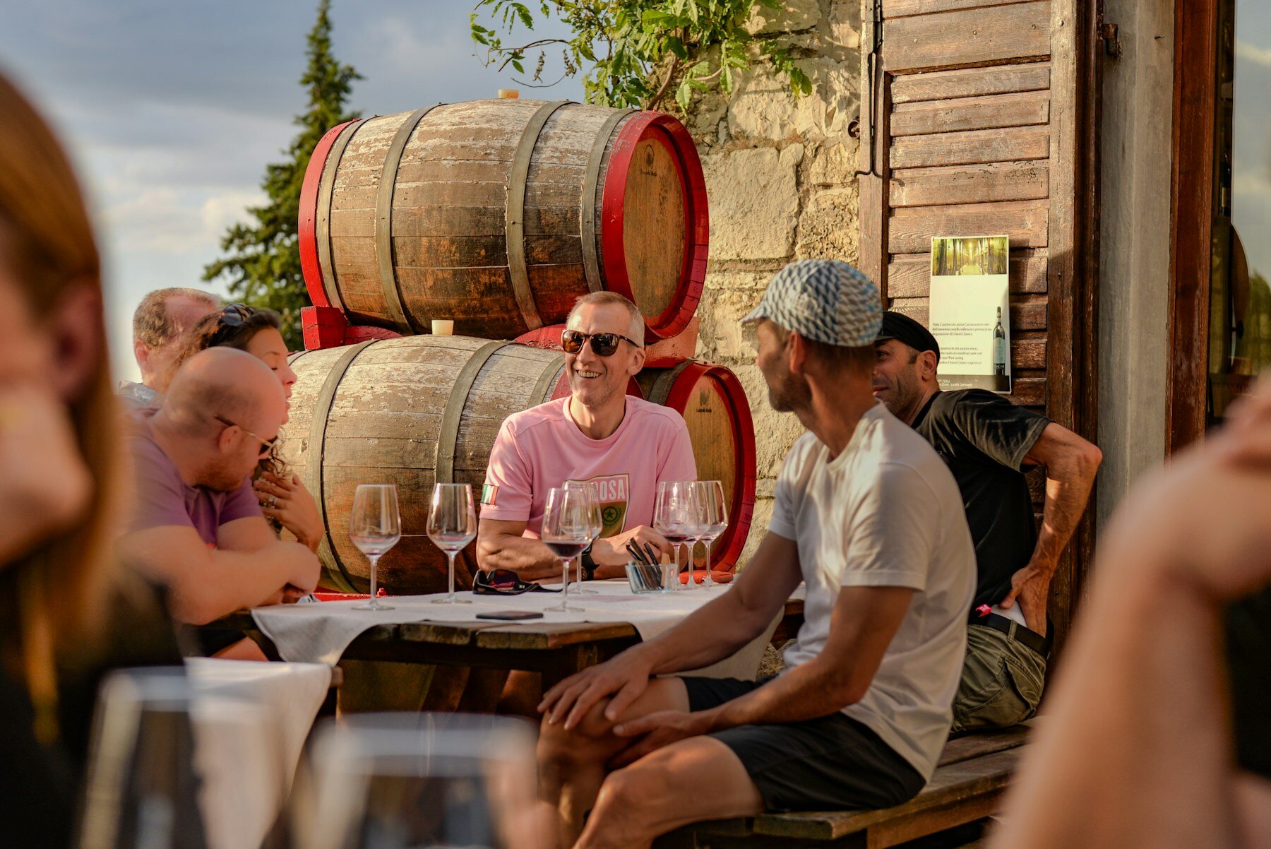 Group enjoying a wine tasting at a winery